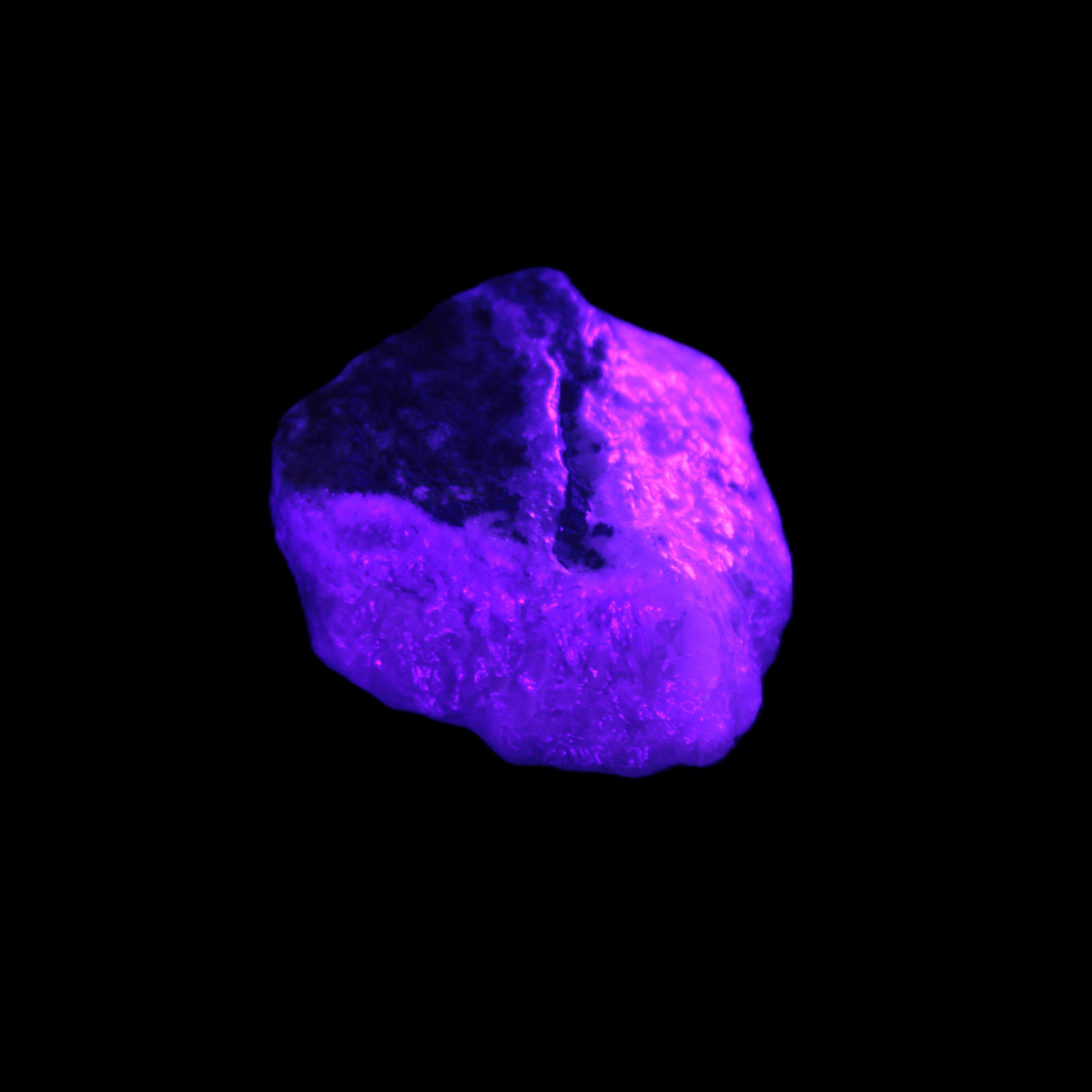 Pink Aragonite specimen 32*15*29mm 21.7g in UV light - Rocks and Things Store
