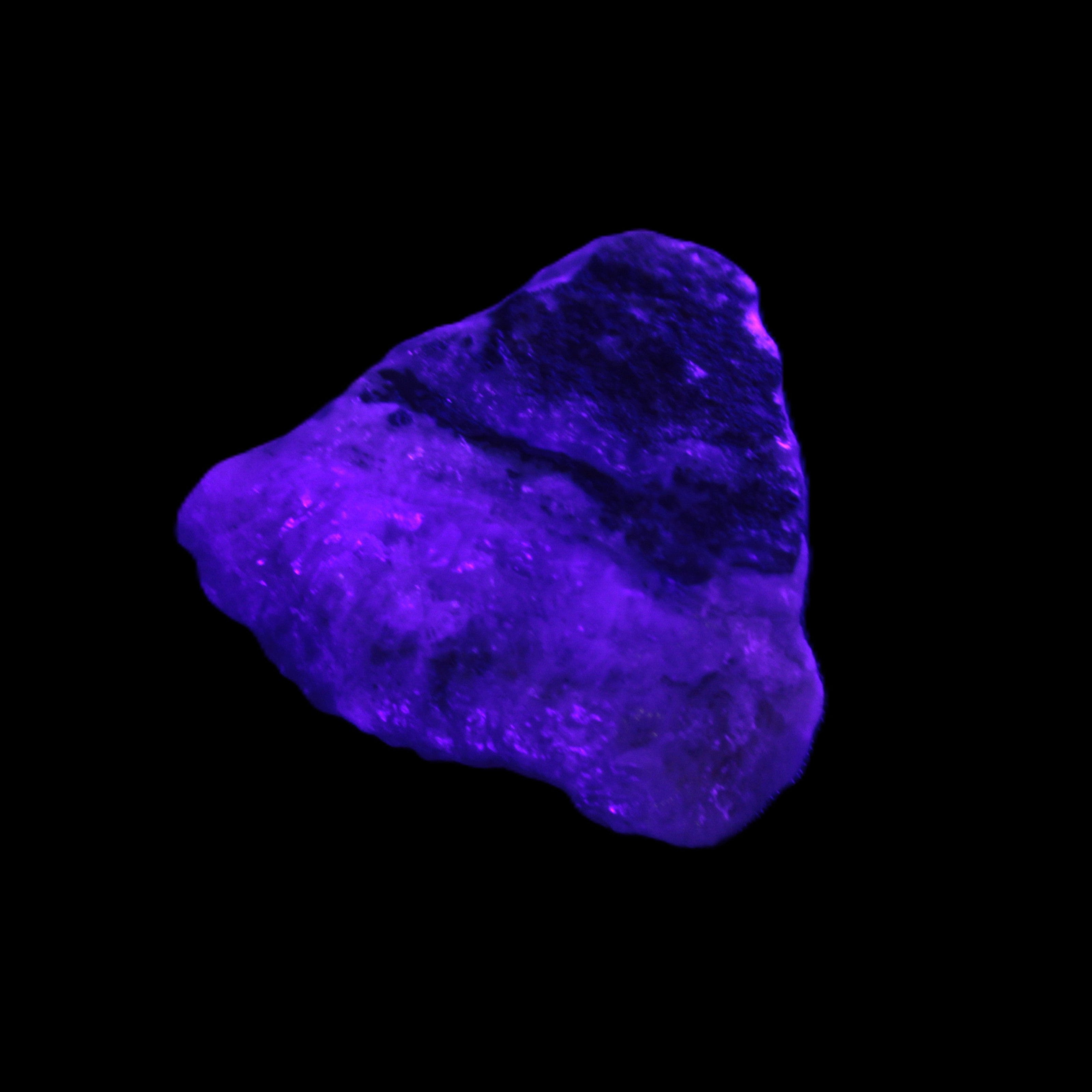 Pink Aragonite specimen 32*15*29mm 21.7g in UV light - Rocks and Things Store