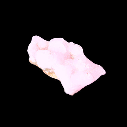 Pink Aragonite specimen 35*19*20mm 12.5g in bright sunlight
