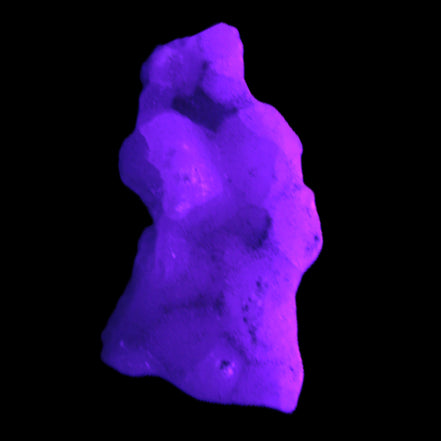 Pink Aragonite specimen 35*19*20mm 12.5g in  UV light