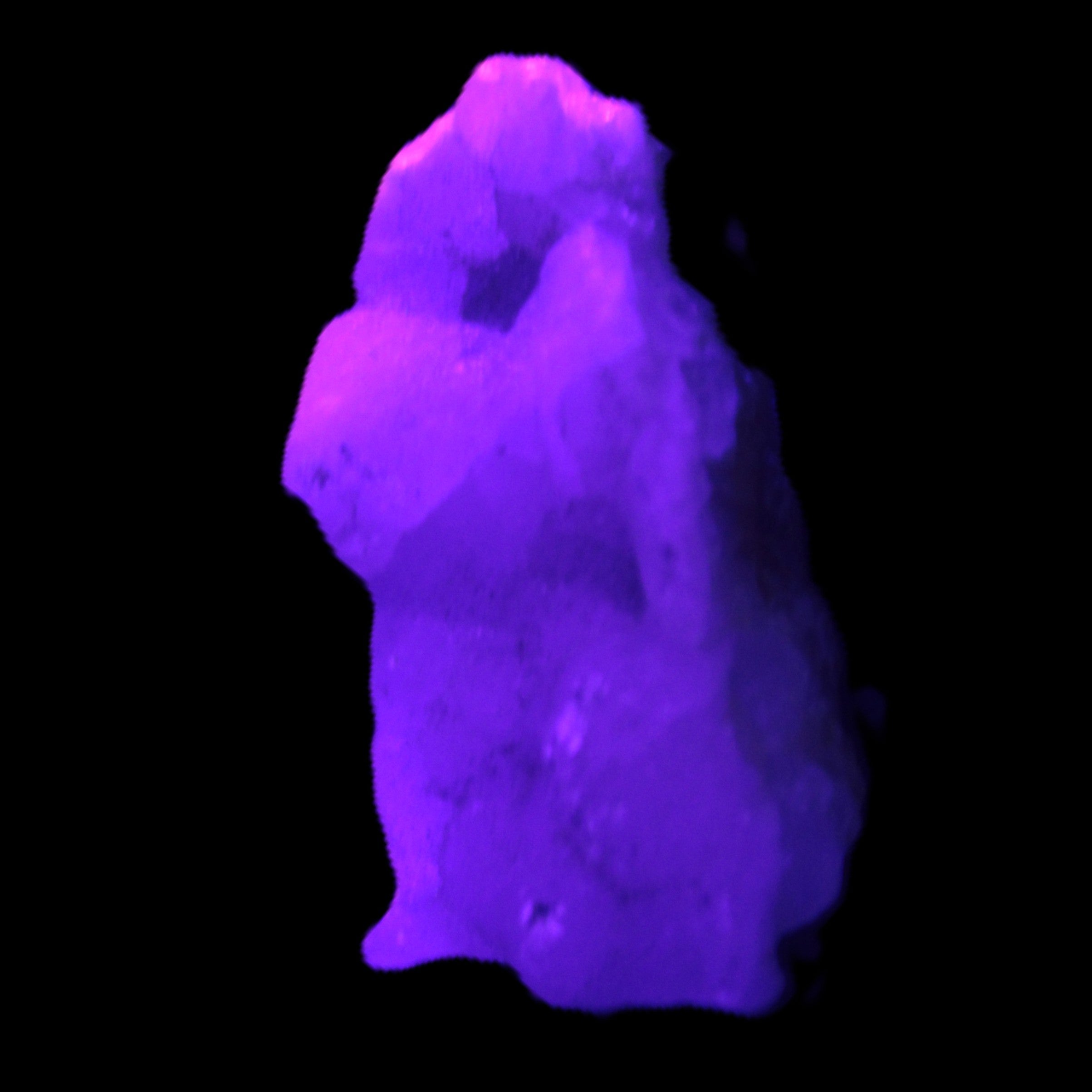 Pink Aragonite specimen 35*19*20mm 12.5g in  UV light