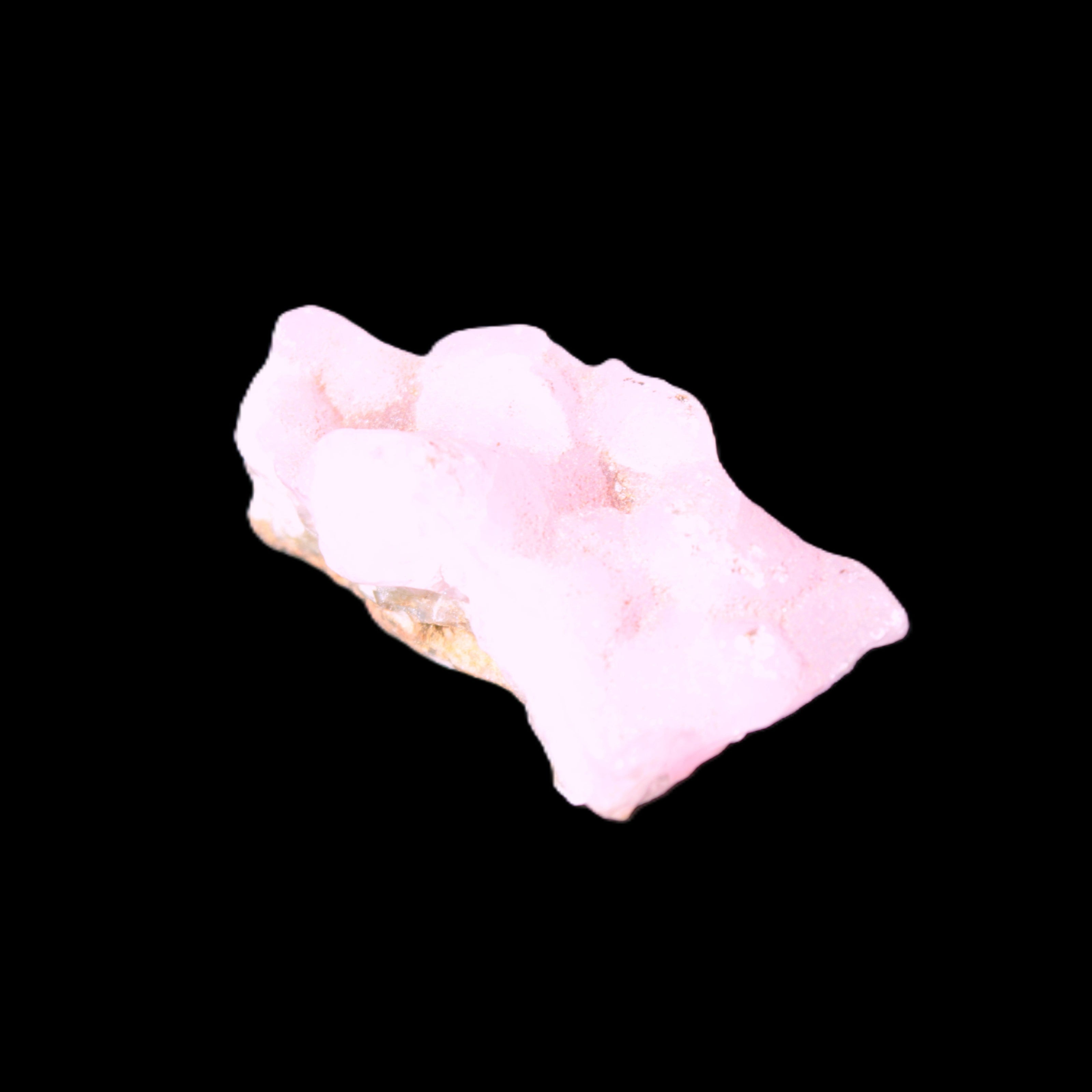 Pink Aragonite specimen 35*19*20mm 12.5g in bright sunlight