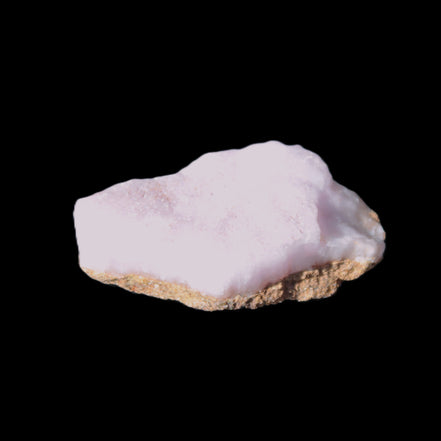 Pink Aragonite specimen 42*11*25mm 18.2g in bright sunlight