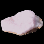 Pink Aragonite specimen 42*11*25mm 18.2g in bright sunlight