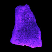 Pink Aragonite specimen on Ironstone matrix  in UV light - 43*24*35mm 40g