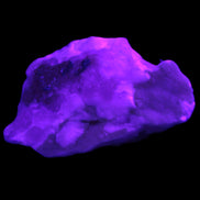 Pink Aragonite specimen from Pakistan 44*13*30mm 21.1g in UV light - Rocks and Things Store