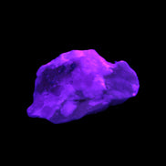 Pink Aragonite specimen from Pakistan 44*13*30mm 21.1g in UV light - Rocks and Things Store