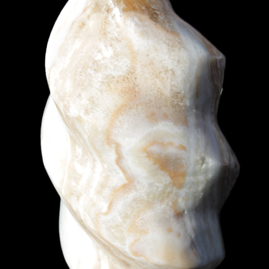 Caribbean Calcite flame 58*115mm 538g in sunlight - Rocks and Things Store