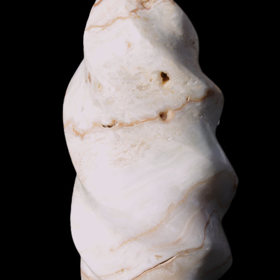 Caribbean Calcite flame 55*117mm 449.7g in sunlight - Rocks and Things Store