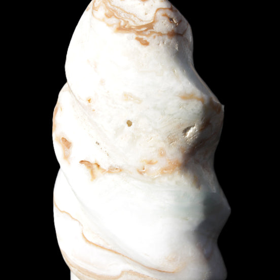 Caribbean Calcite flame 55*117mm 449.7g in sunlight - Rocks and Things Store