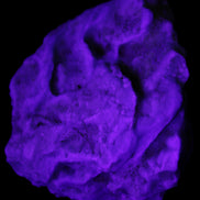 Blue Aragonite Caribbean Calcite specimen 97*53*85mm 395g in UV light - Rocks and Things Store