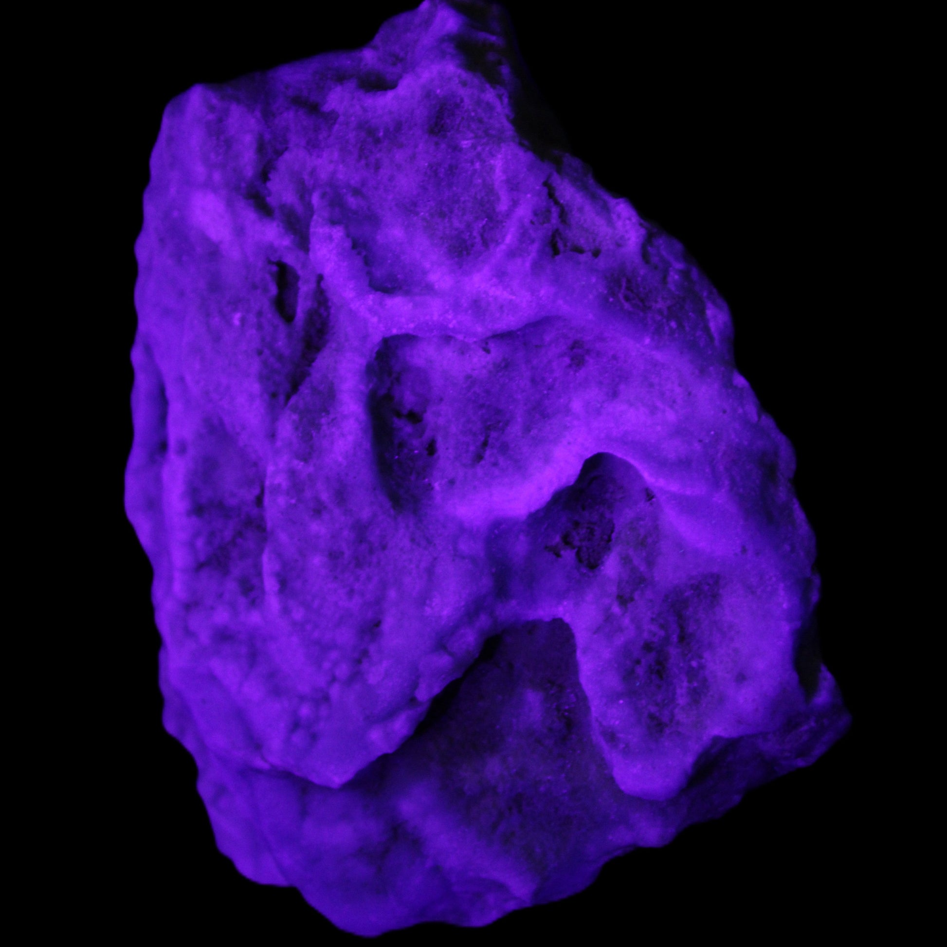 Blue Aragonite Caribbean Calcite specimen 97*53*85mm 395g in UV light - Rocks and Things Store