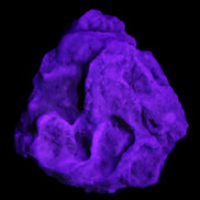 Blue Aragonite Caribbean Calcite specimen 97*53*85mm 395g in UV light - Rocks and Things Store