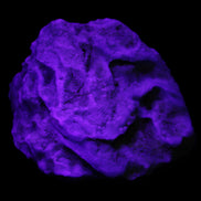 Blue Aragonite Caribbean Calcite specimen 97*53*85mm 395g in UV light - Rocks and Things Store