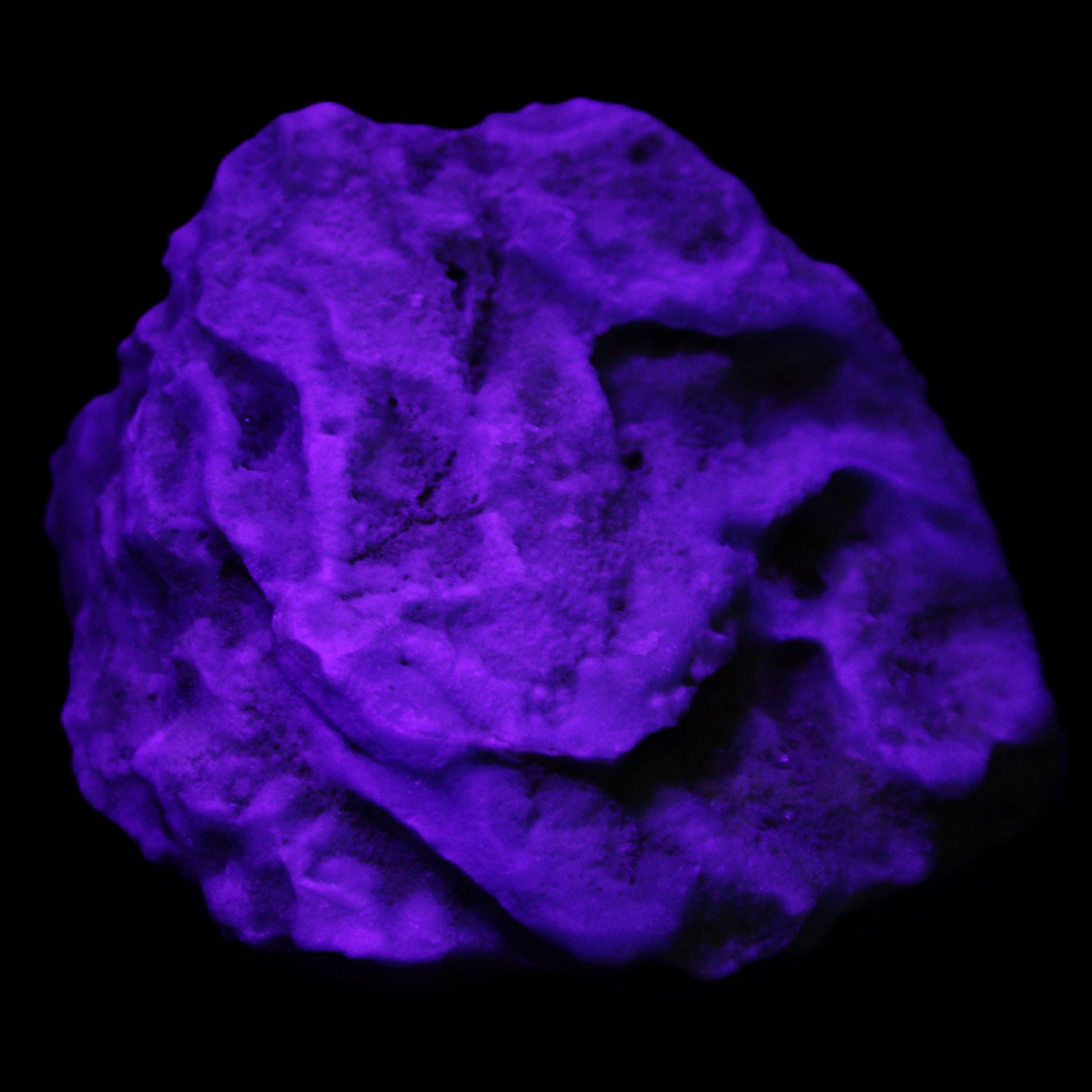 Blue Aragonite Caribbean Calcite specimen 97*53*85mm 395g in UV light - Rocks and Things Store