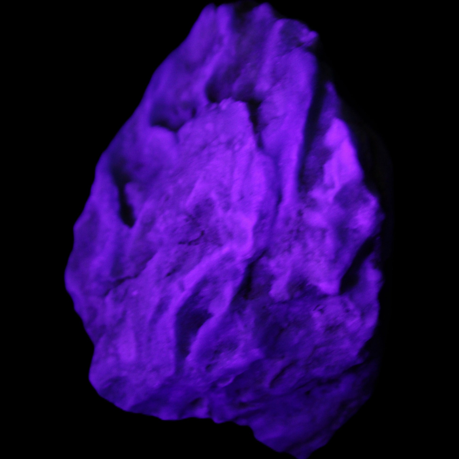 Blue Aragonite Caribbean Calcite specimen 97*53*85mm 395g in UV light - Rocks and Things Store