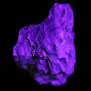 Blue Aragonite Caribbean Calcite specimen 97*53*85mm 395g in UV light - Rocks and Things Store