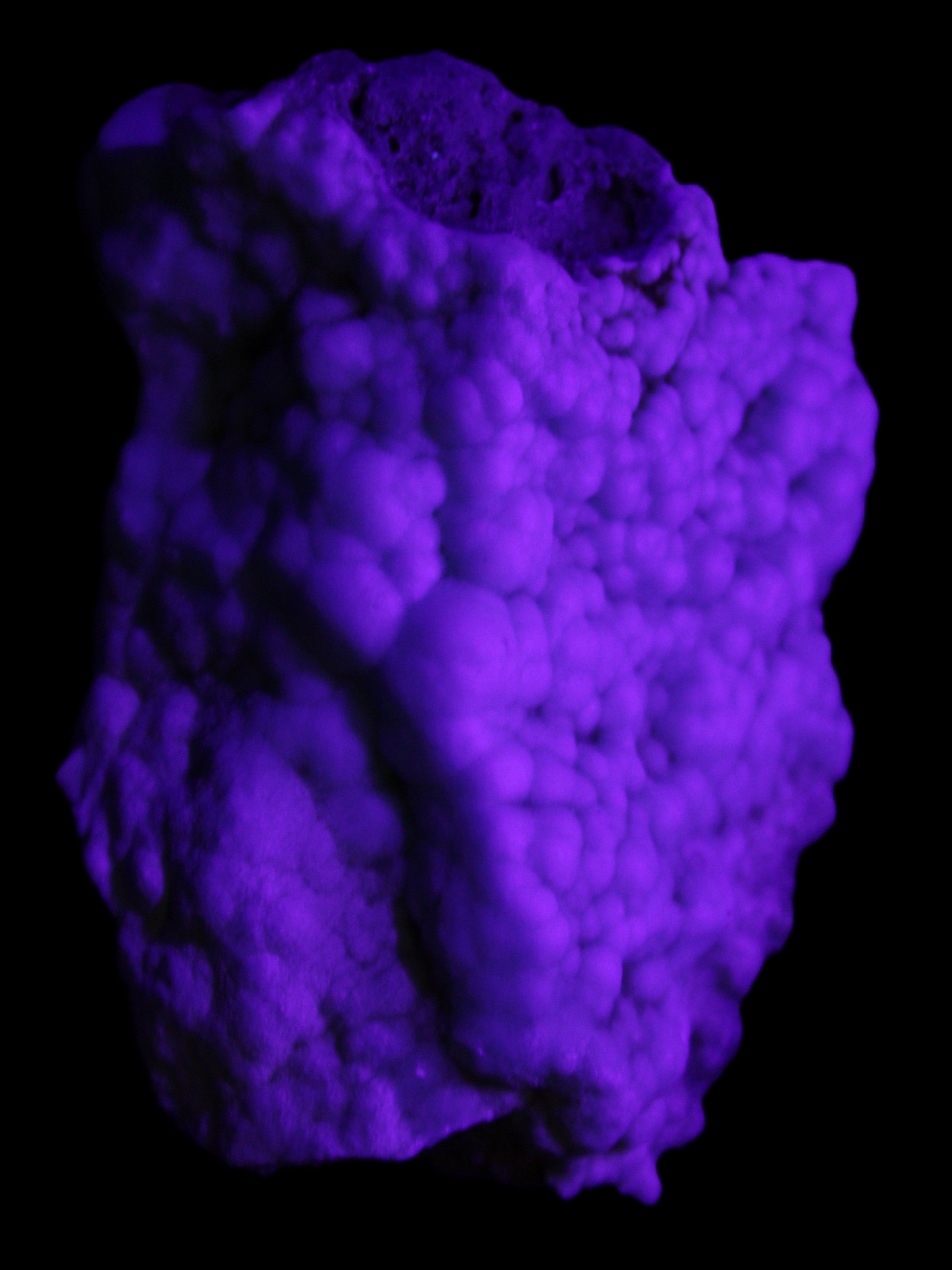 Blue Aragonite Caribbean Calcite specimen 95*48*68mm 352.2g in UV light - Rocks and Things Store