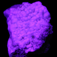 Blue Aragonite Caribbean Calcite specimen 95*48*68mm 352.2g in UV light - Rocks and Things Store