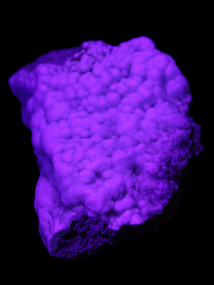 Blue Aragonite Caribbean Calcite specimen 95*48*68mm 352.2g in UV light - Rocks and Things Store