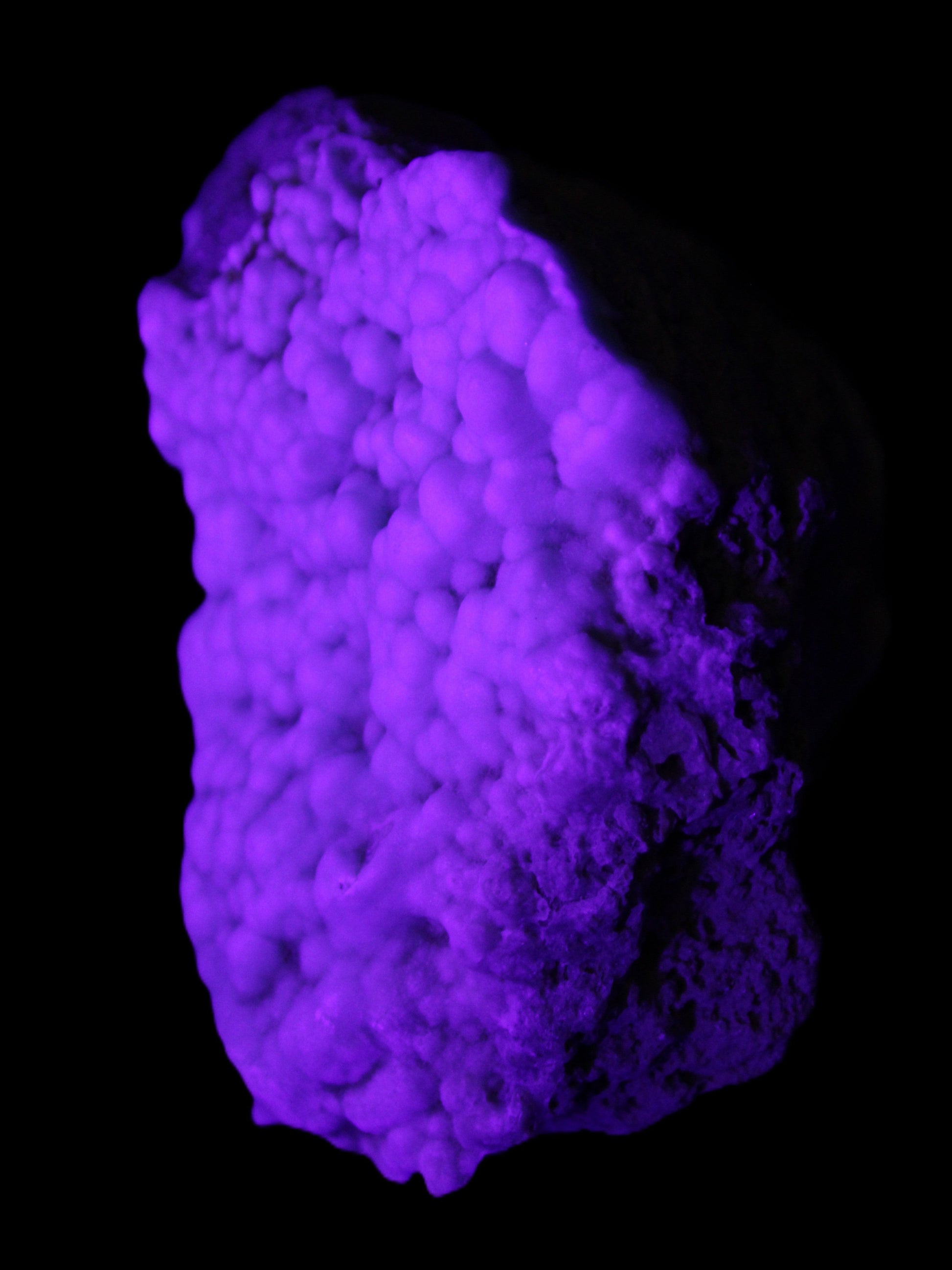 Blue Aragonite Caribbean Calcite specimen 95*48*68mm 352.2g in UV light - Rocks and Things Store