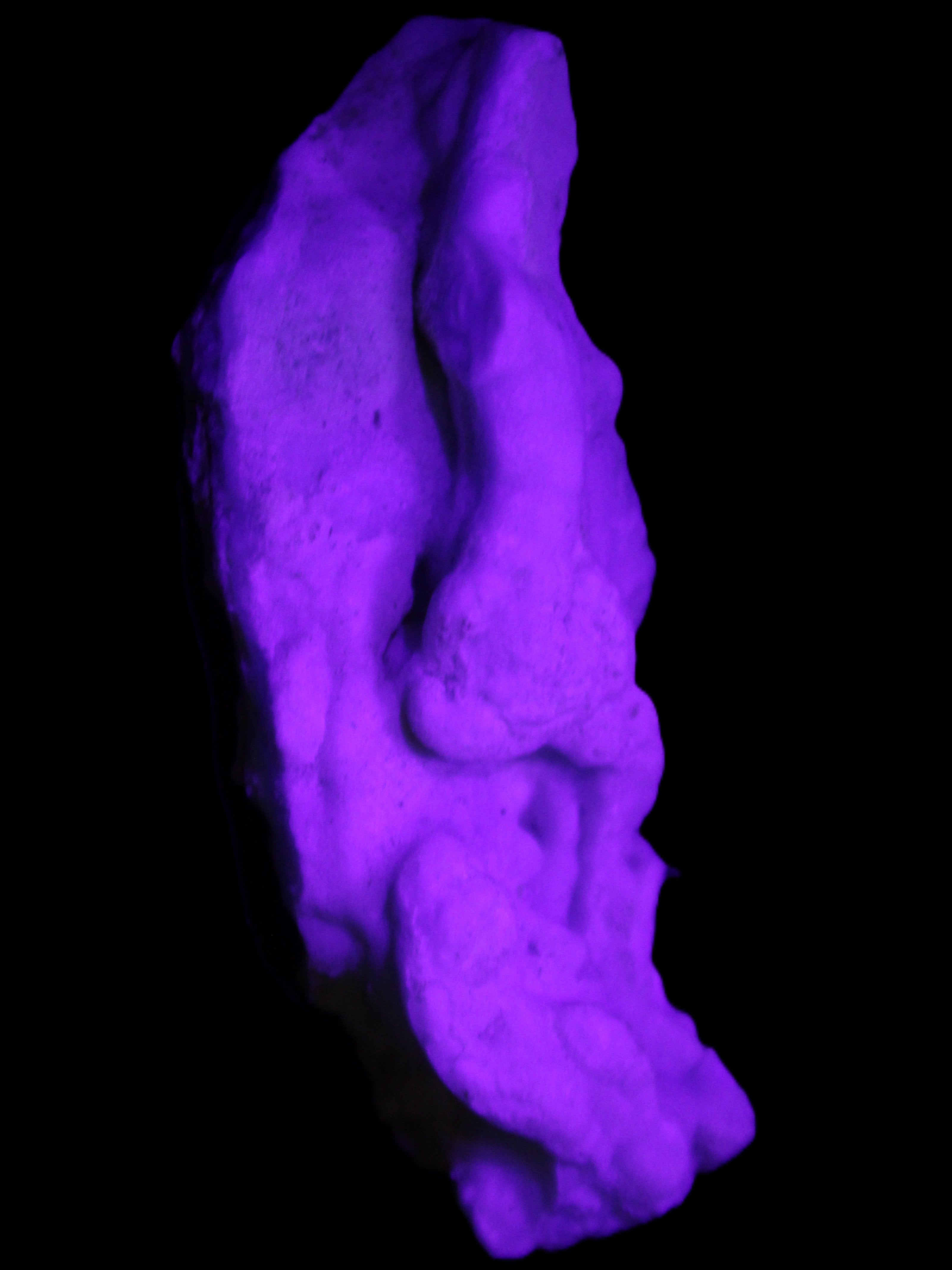 Blue Aragonite specimen 102*22*42mm 100g in UV light - Rocks and Things Store