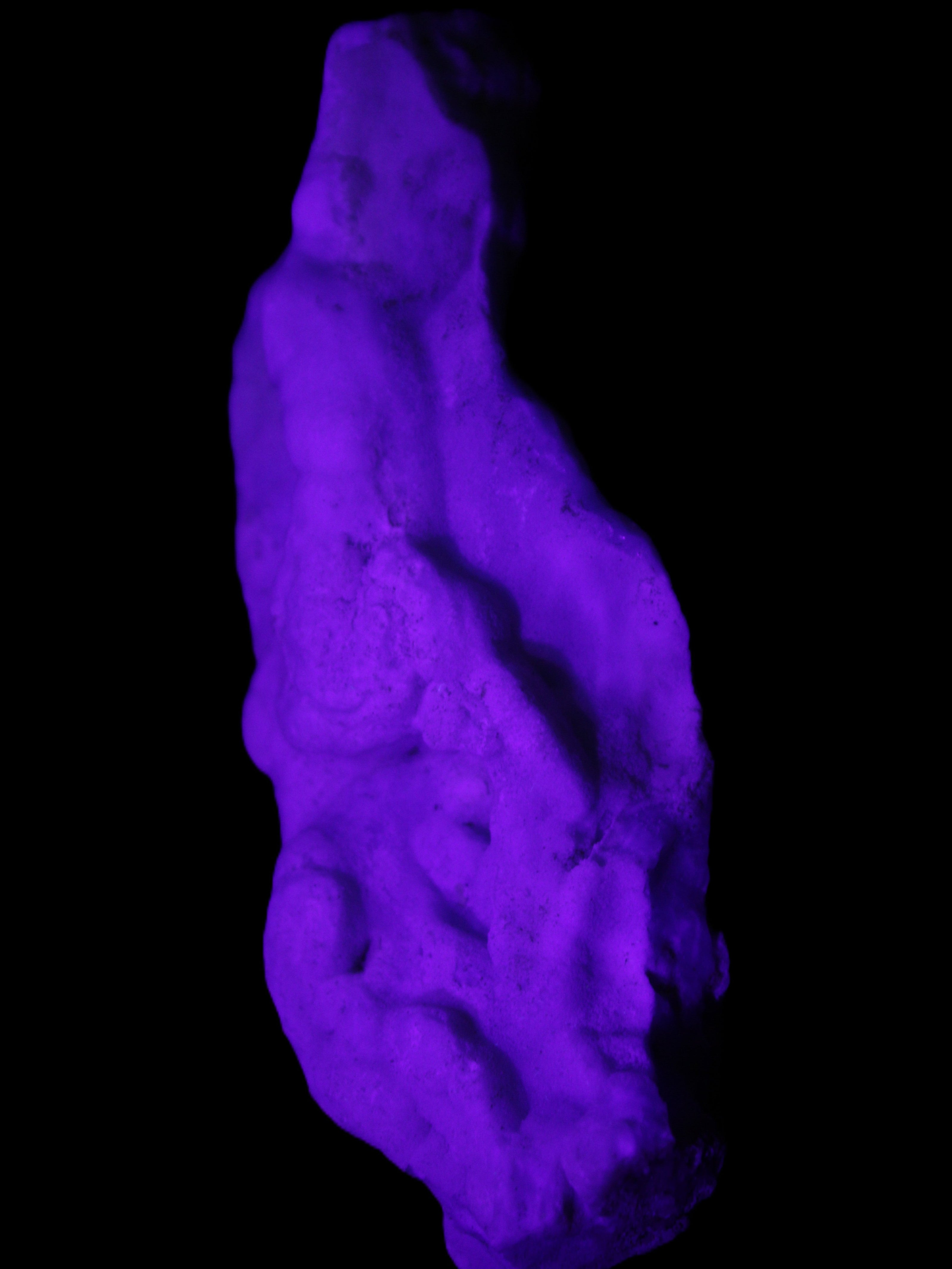 Blue Aragonite specimen 102*22*42mm 100g in UV light - Rocks and Things Store