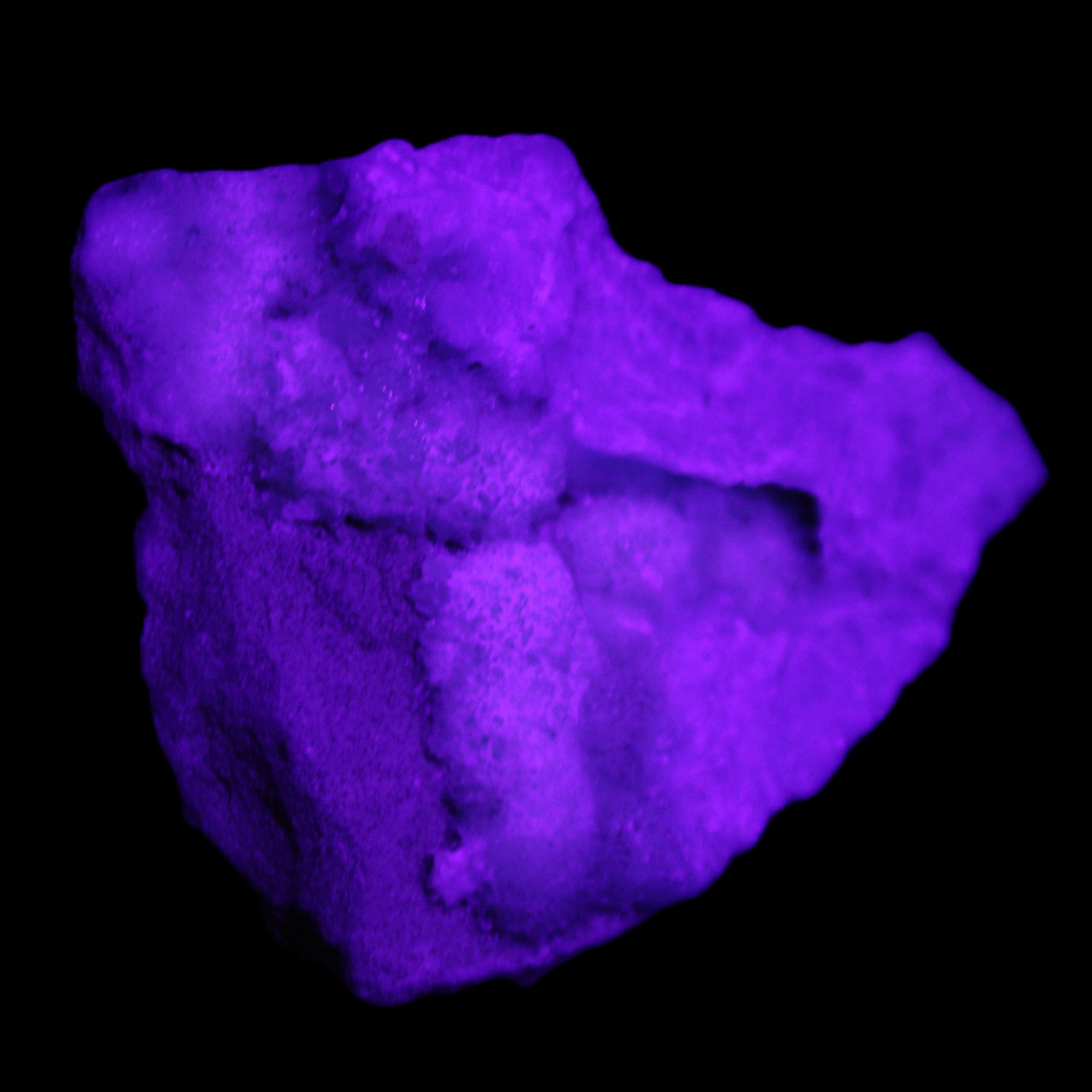 Blue Aragonite specimen 85*23*65mm 122g in UV light - Rocks and Things Store