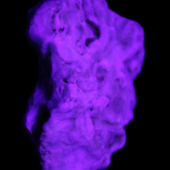 Blue Aragonite 76*22*55mm 88g in UV light - Rocks and Things Store