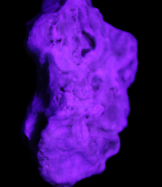 Blue Aragonite 76*22*55mm 88g in UV light - Rocks and Things Store