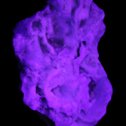 Blue Aragonite 76*22*55mm 88g in UV light - Rocks and Things Store