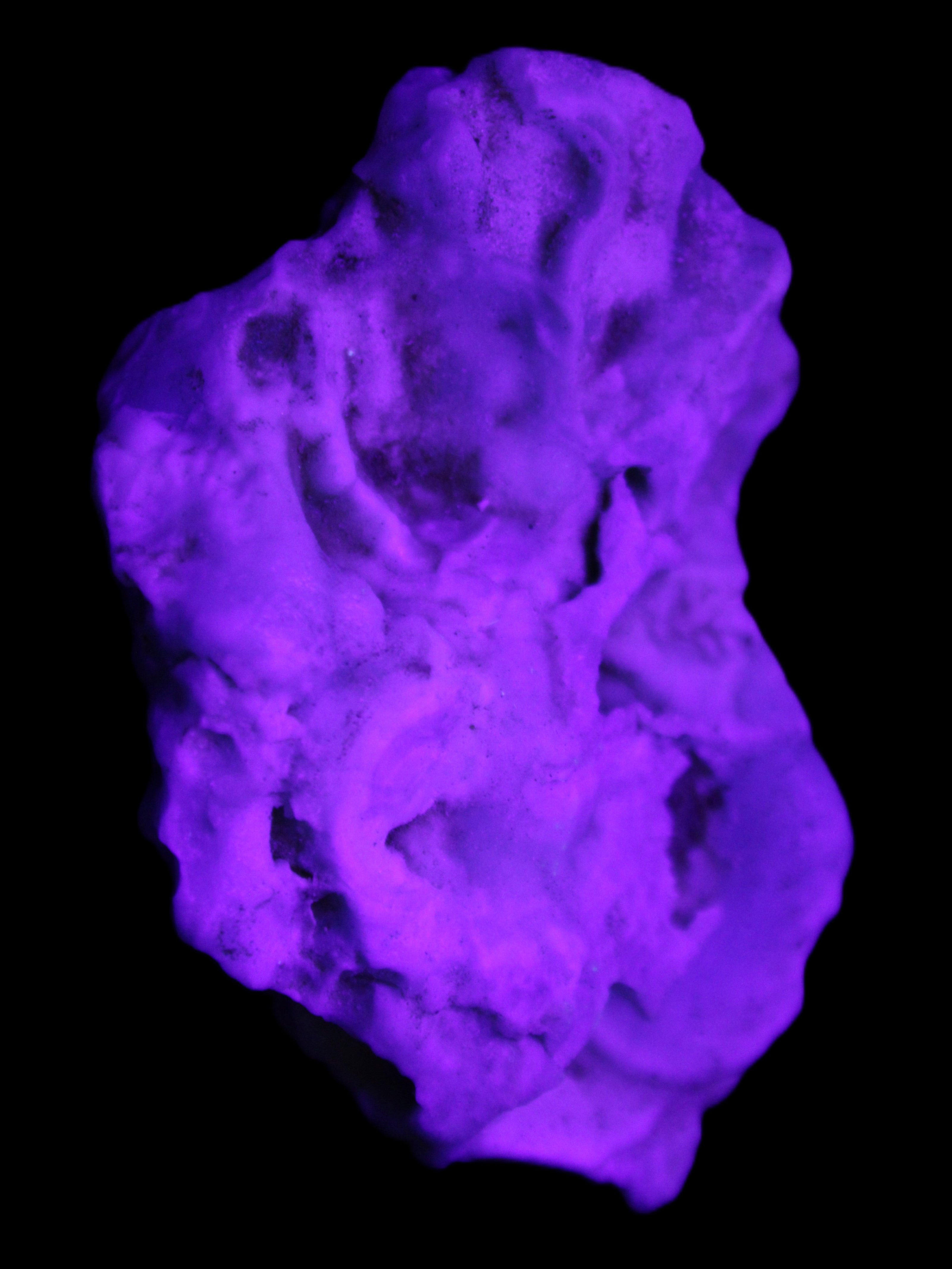 Blue Aragonite 76*22*55mm 88g in UV light - Rocks and Things Store