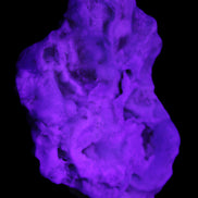 Blue Aragonite 76*22*55mm 88g in UV light - Rocks and Things Store