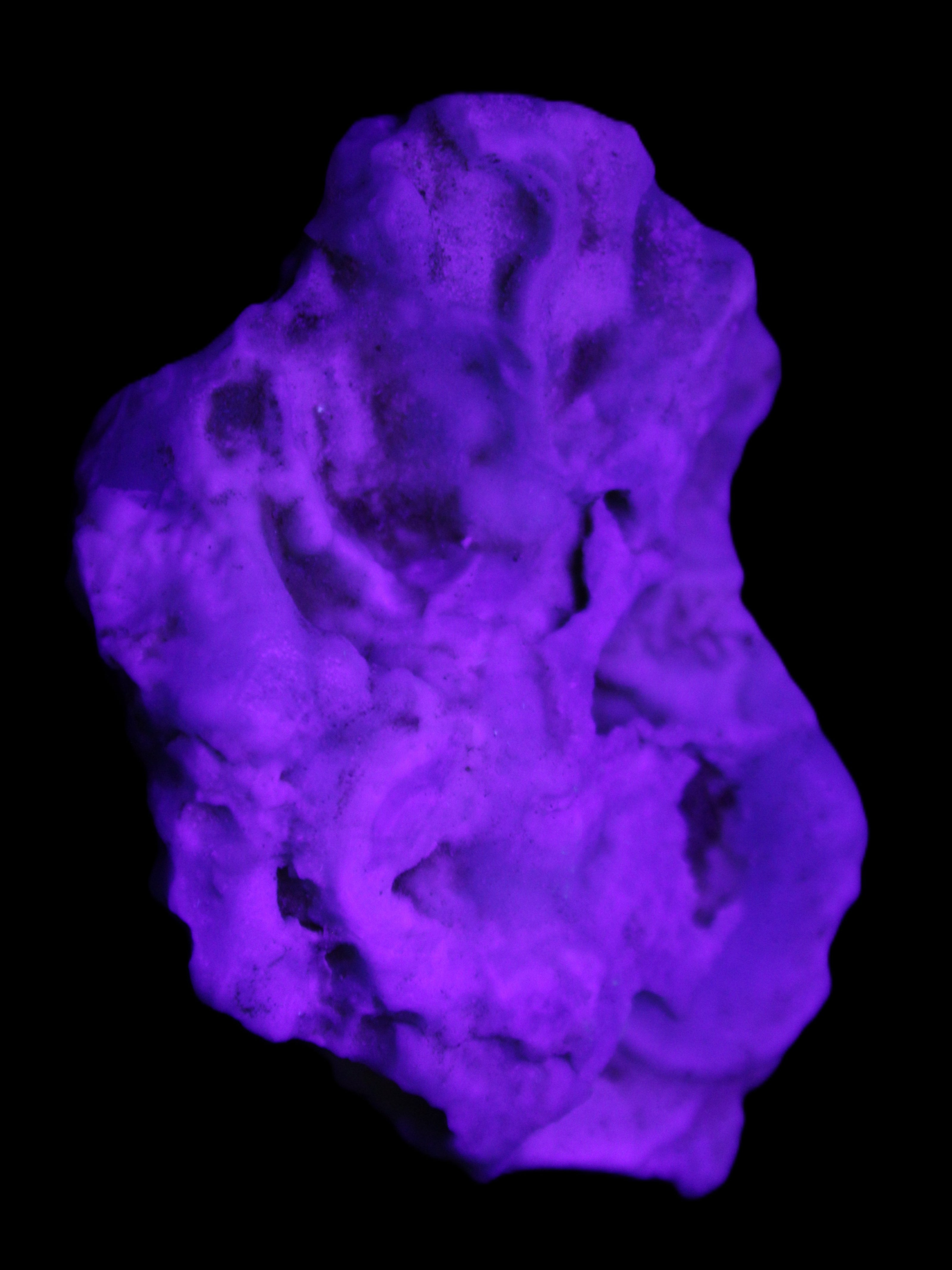 Blue Aragonite 76*22*55mm 88g in UV light - Rocks and Things Store