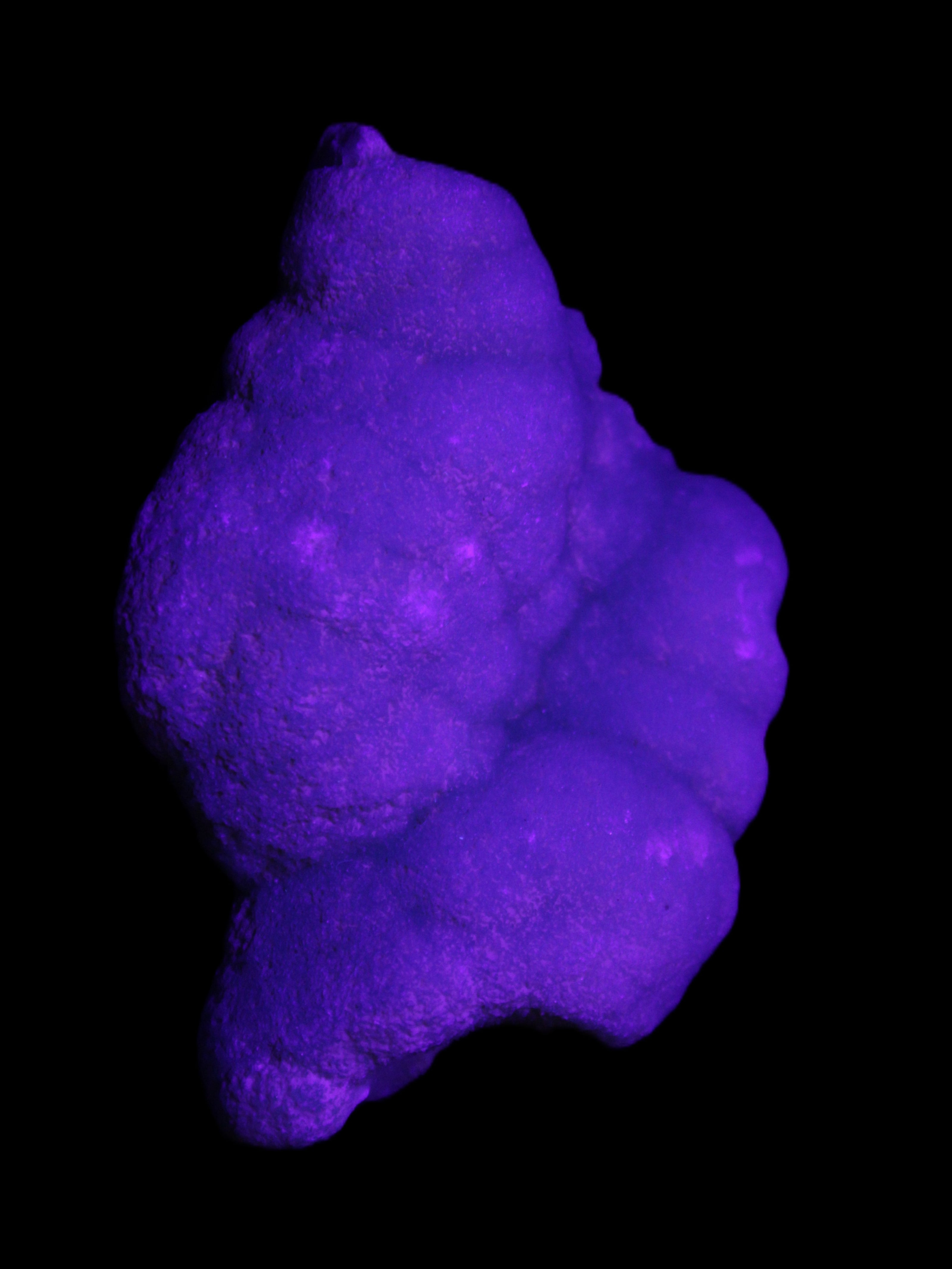 Blue Aragonite specimen 73*22*53mm 100g in UV light - Rocks and Things Store