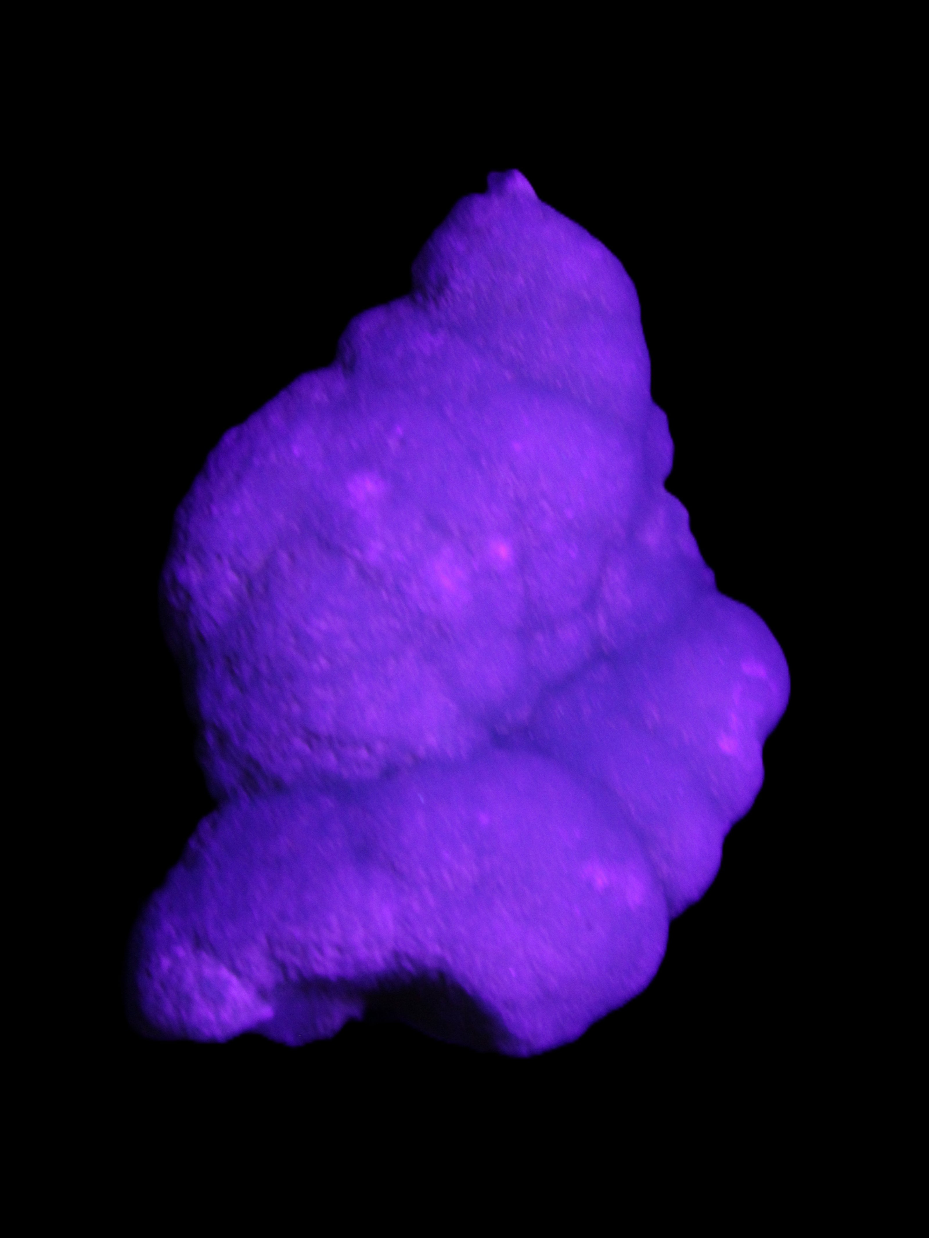 Blue Aragonite specimen 73*22*53mm 100g in UV light - Rocks and Things Store