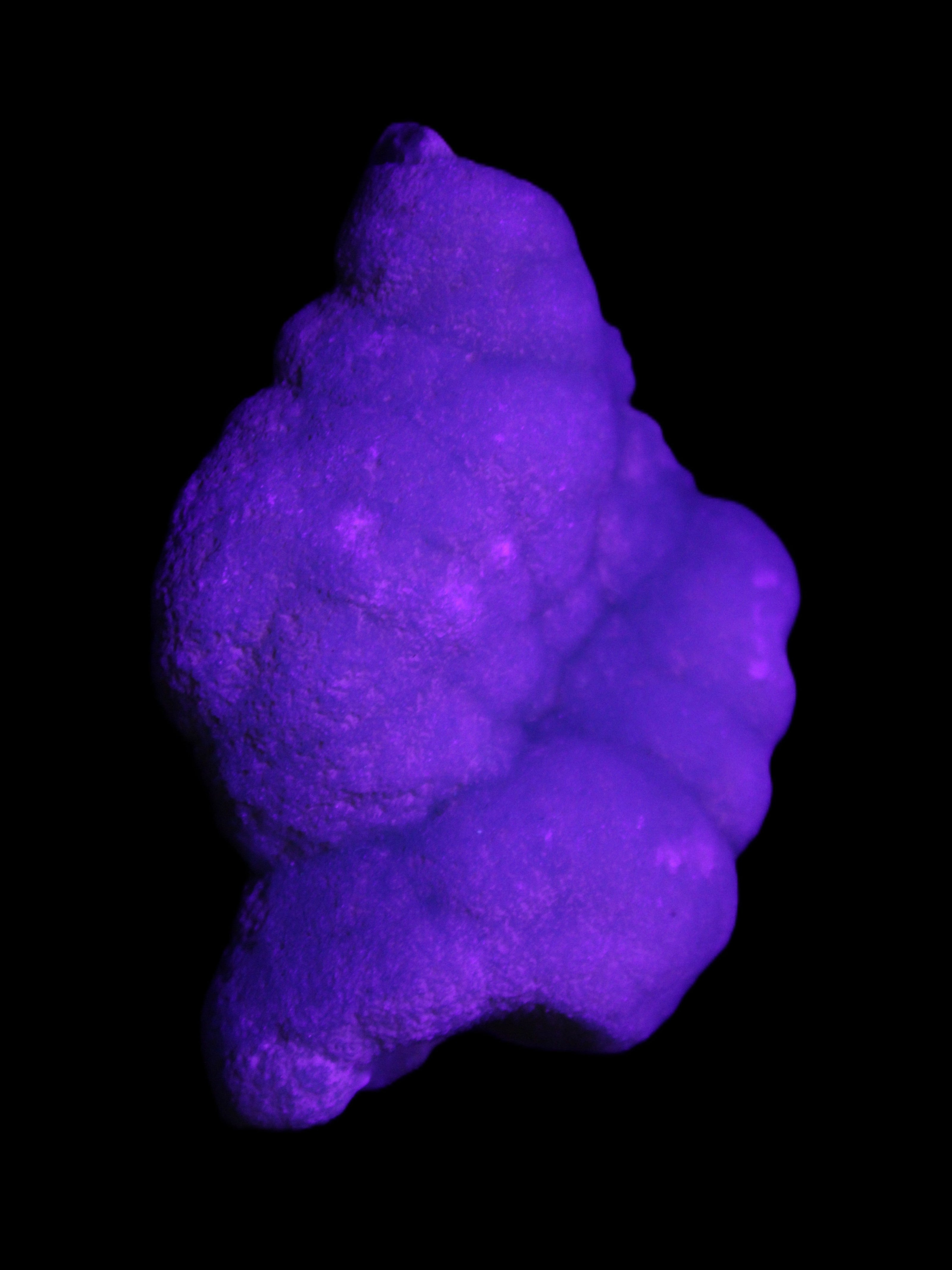 Blue Aragonite specimen 73*22*53mm 100g in UV light - Rocks and Things Store