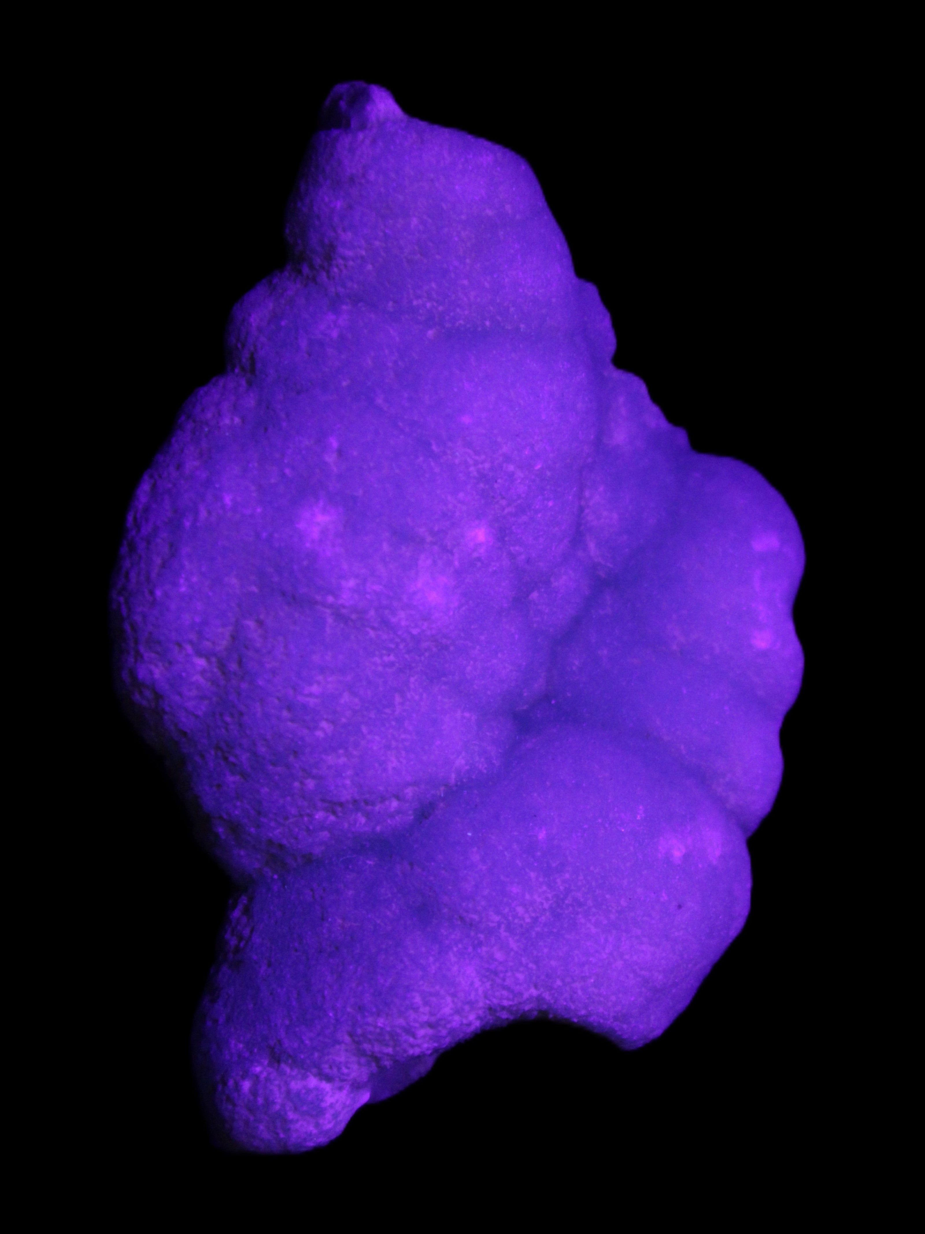 Blue Aragonite specimen 73*22*53mm 100g in UV light - Rocks and Things Store