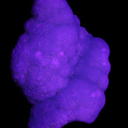 Blue Aragonite specimen 73*22*53mm 100g in UV light - Rocks and Things Store