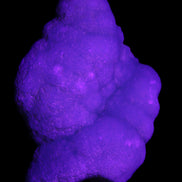 Blue Aragonite specimen 73*22*53mm 100g in UV light - Rocks and Things Store