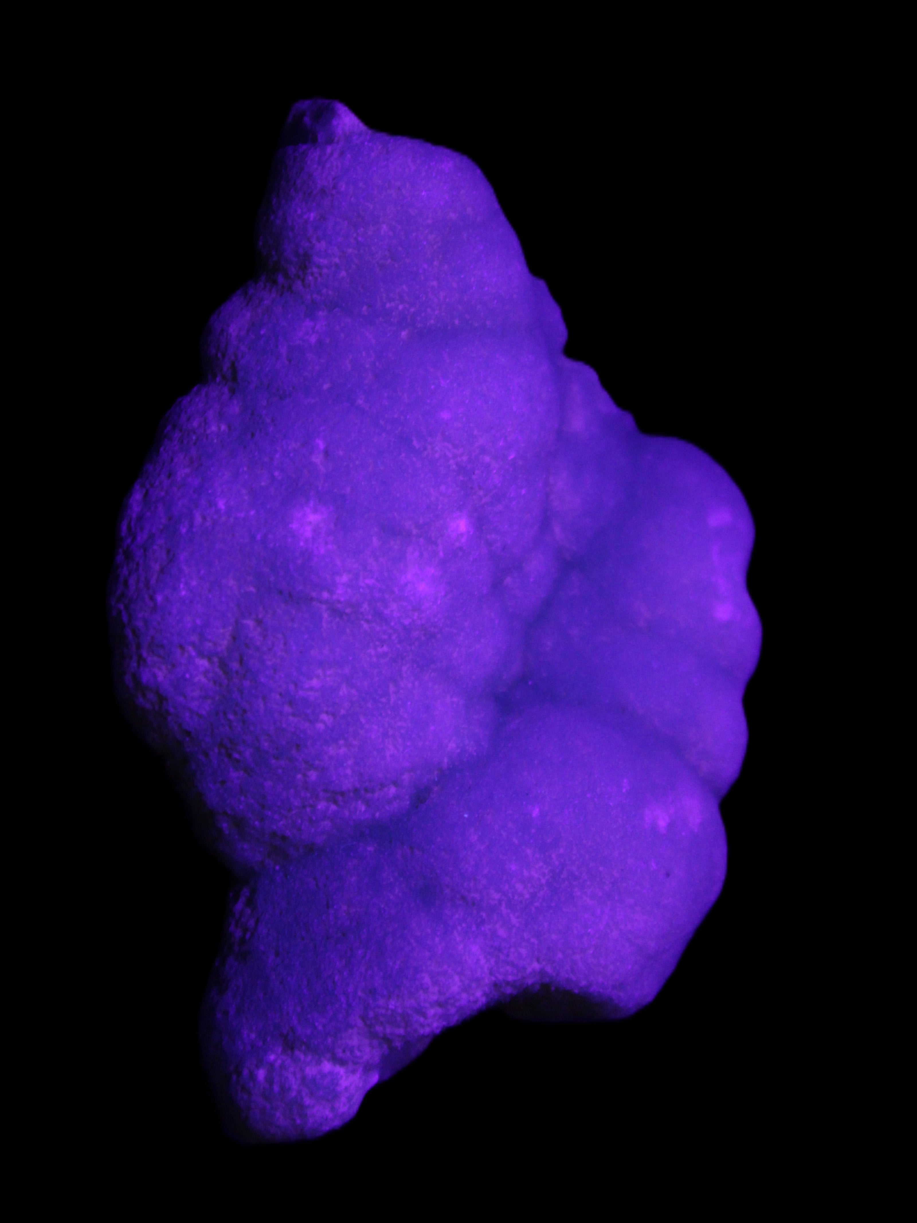 Blue Aragonite specimen 73*22*53mm 100g in UV light - Rocks and Things Store