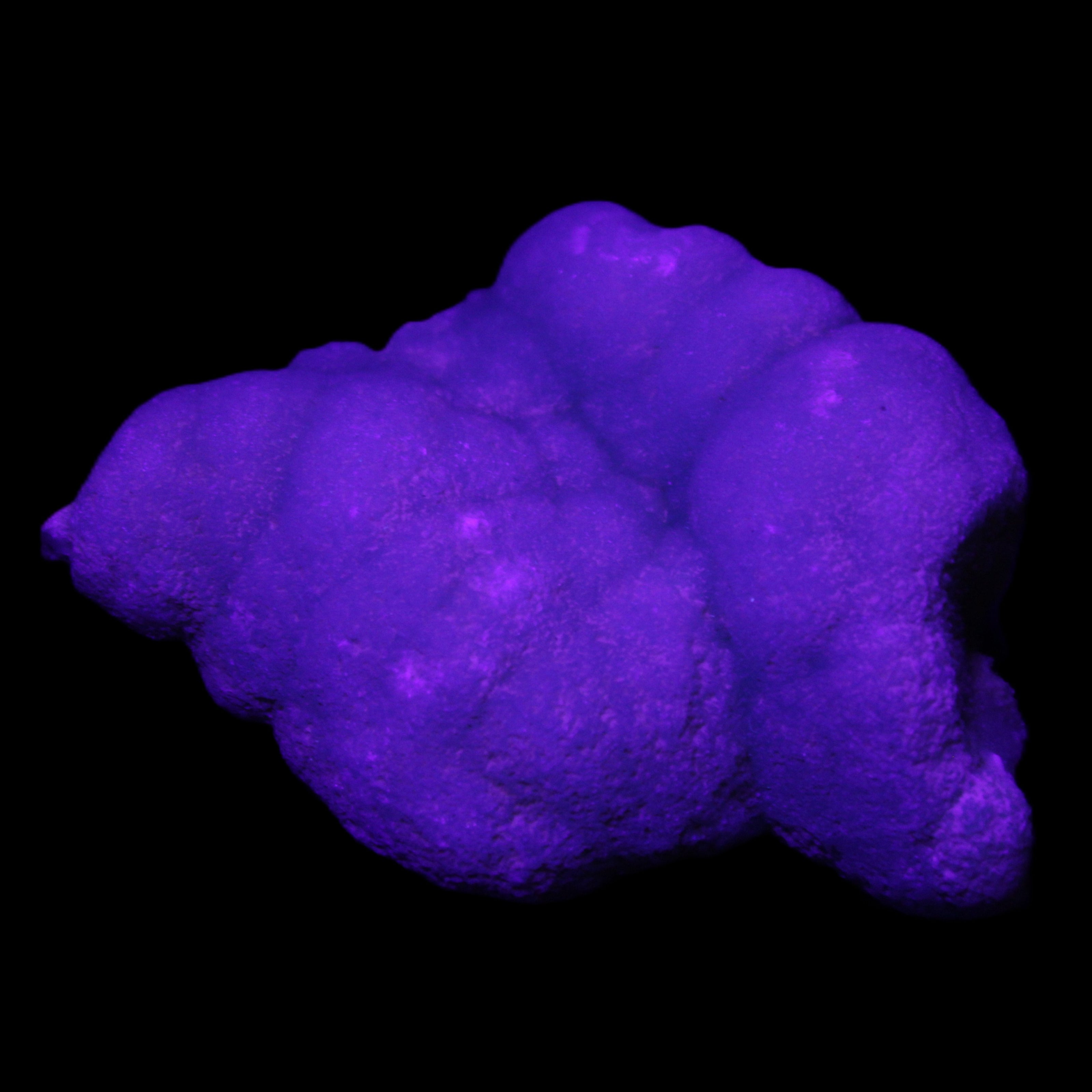 Blue Aragonite specimen 73*22*53mm 100g in UV light - Rocks and Things Store