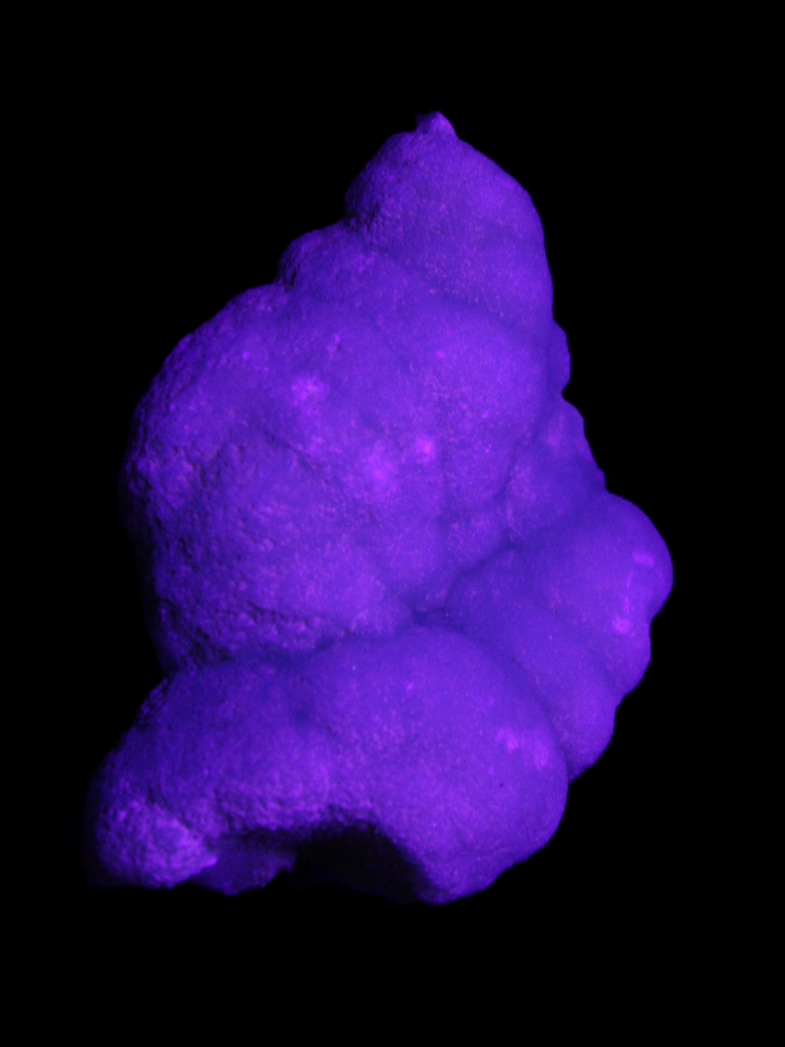 Blue Aragonite specimen 73*22*53mm 100g in UV light - Rocks and Things Store