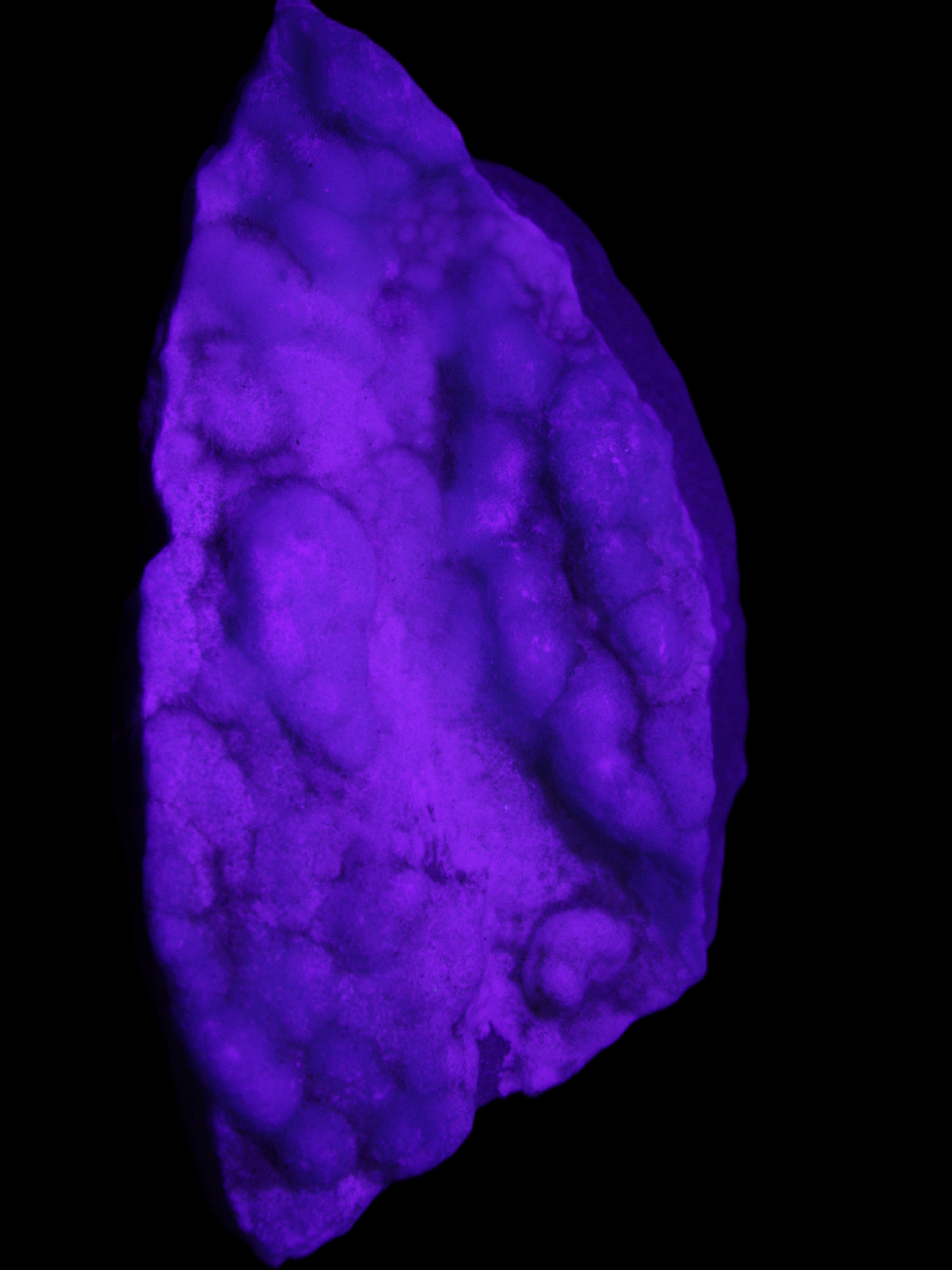 Blue Aragonite specimen 112*35*80mm 270g in UV light - Rocks and Things Store