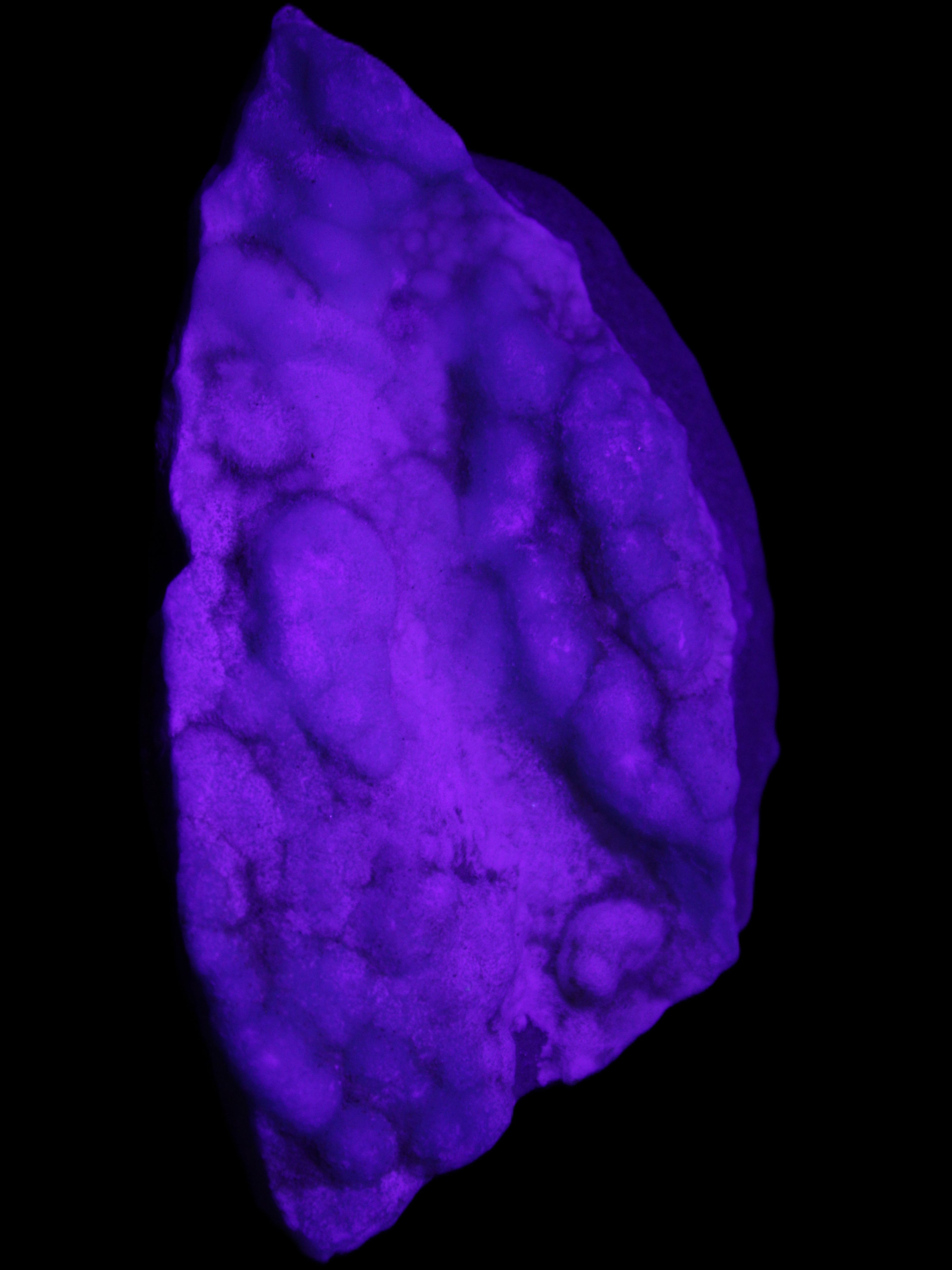 Blue Aragonite specimen 112*35*80mm 270g in UV light - Rocks and Things Store