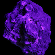 Blue Aragonite Caribbean Calcite specimen 95*55*93mm 343g in UV light - Rocks and Things Store