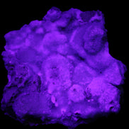 Blue Aragonite Caribbean Calcite specimen 95*55*93mm 343g in UV light - Rocks and Things Store