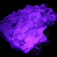 Blue Aragonite Caribbean Calcite specimen 95*55*93mm 343g in UV light - Rocks and Things Store