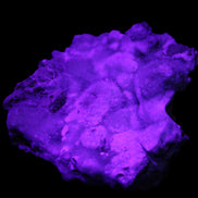 Blue Aragonite Caribbean Calcite specimen 95*55*93mm 343g in UV light - Rocks and Things Store