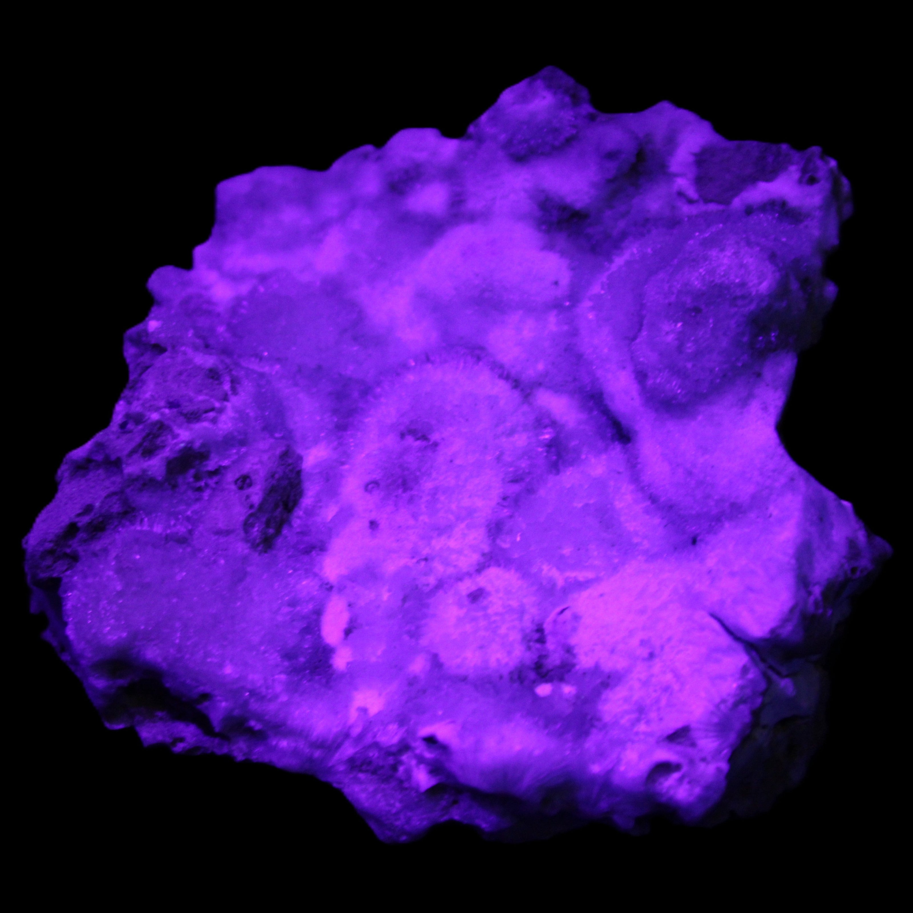 Blue Aragonite Caribbean Calcite specimen 95*55*93mm 343g in UV light - Rocks and Things Store